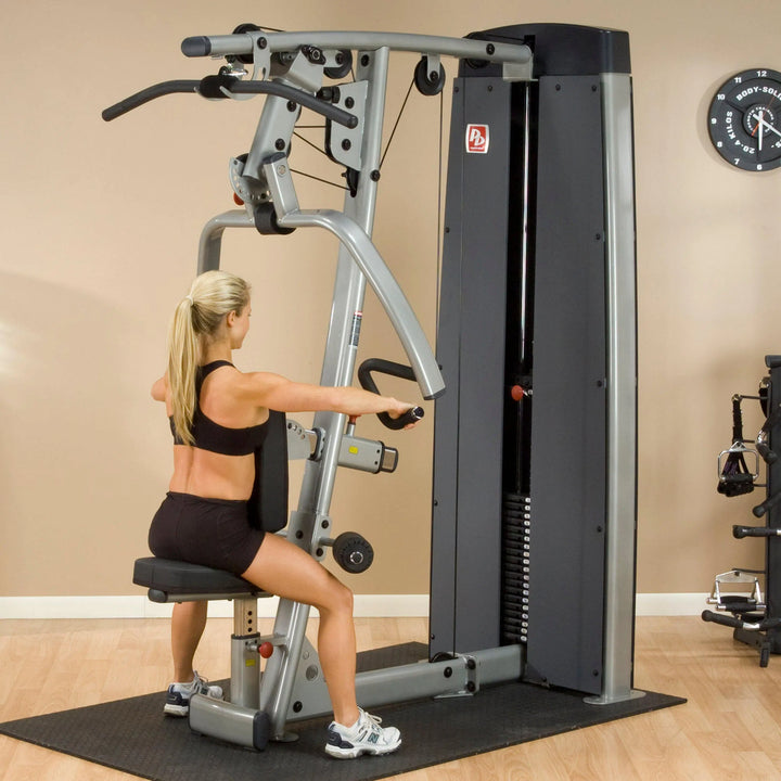 woman back row workout on Body-Solid Chest and Back Machine DPLSSF
