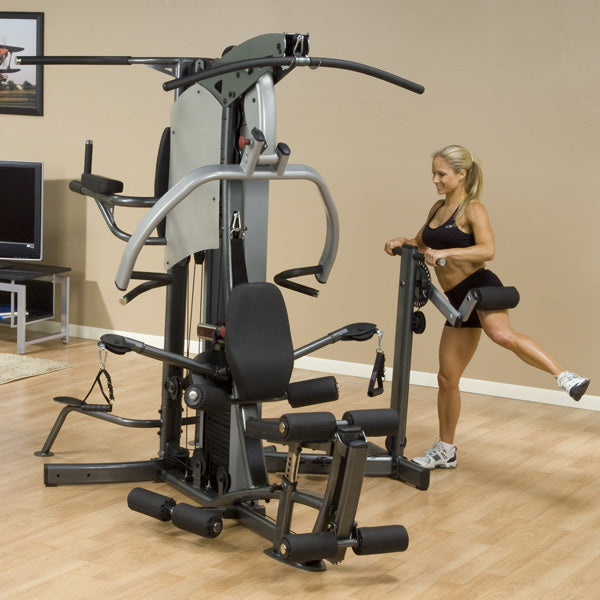 A woman training on the Body-Solid Fusion Commercial Exercise Machine F500