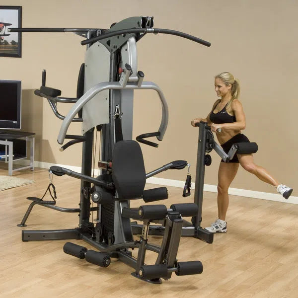 A woman training on the Body-Solid Fusion Commercial Exercise Machine F500