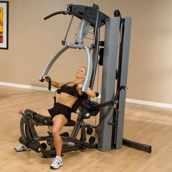 woman incline chest press exercise on Body-Solid Fusion Commercial Exercise Machine F600