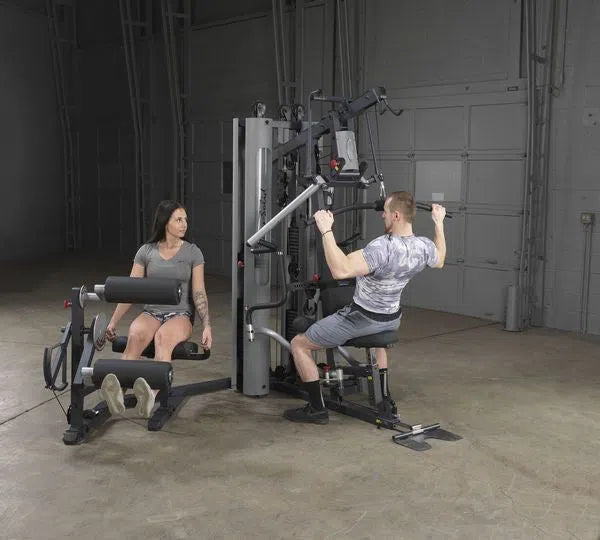 A couple training together on the Body-Solid All-in-One Exercise Machine G10B
