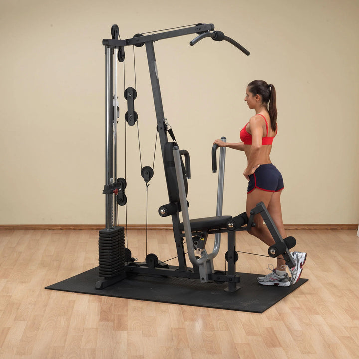 woman cable leg curl exercise on Body-Solid Compact Home Gym G1S
