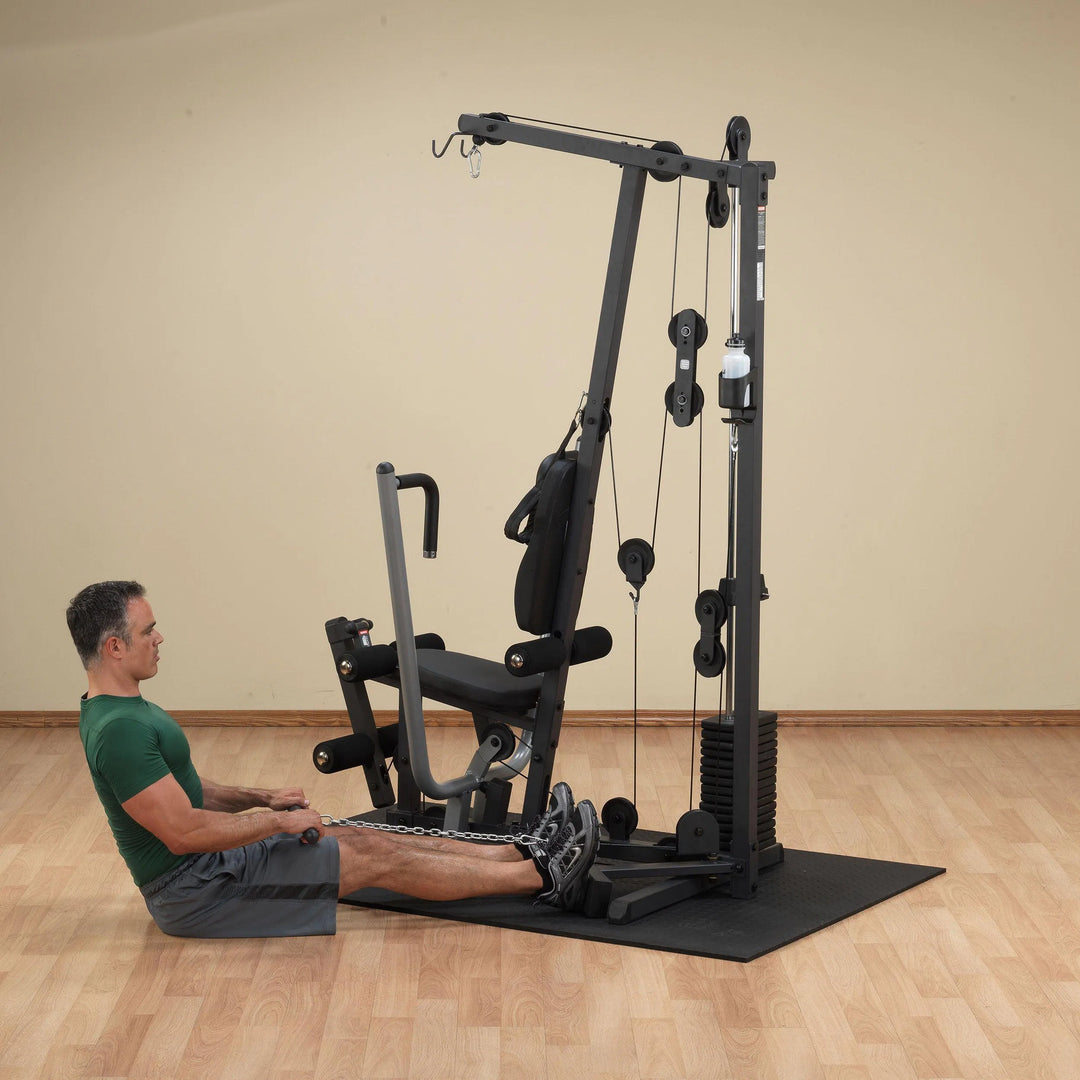 man floor seated low row on Body-Solid Compact Home Gym G1S