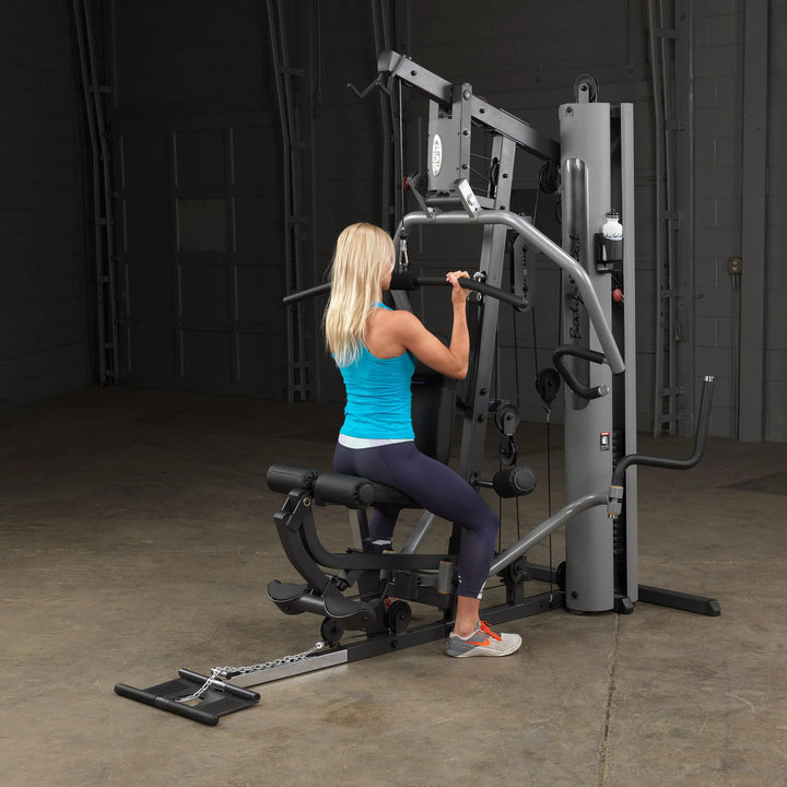 woman lat pull down workout on Body-Solid Compact Weight Machine G5S