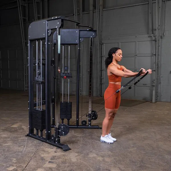 woman front shoulder raise exercise on Body-Solid Functional Trainer Machine GFT100 front view