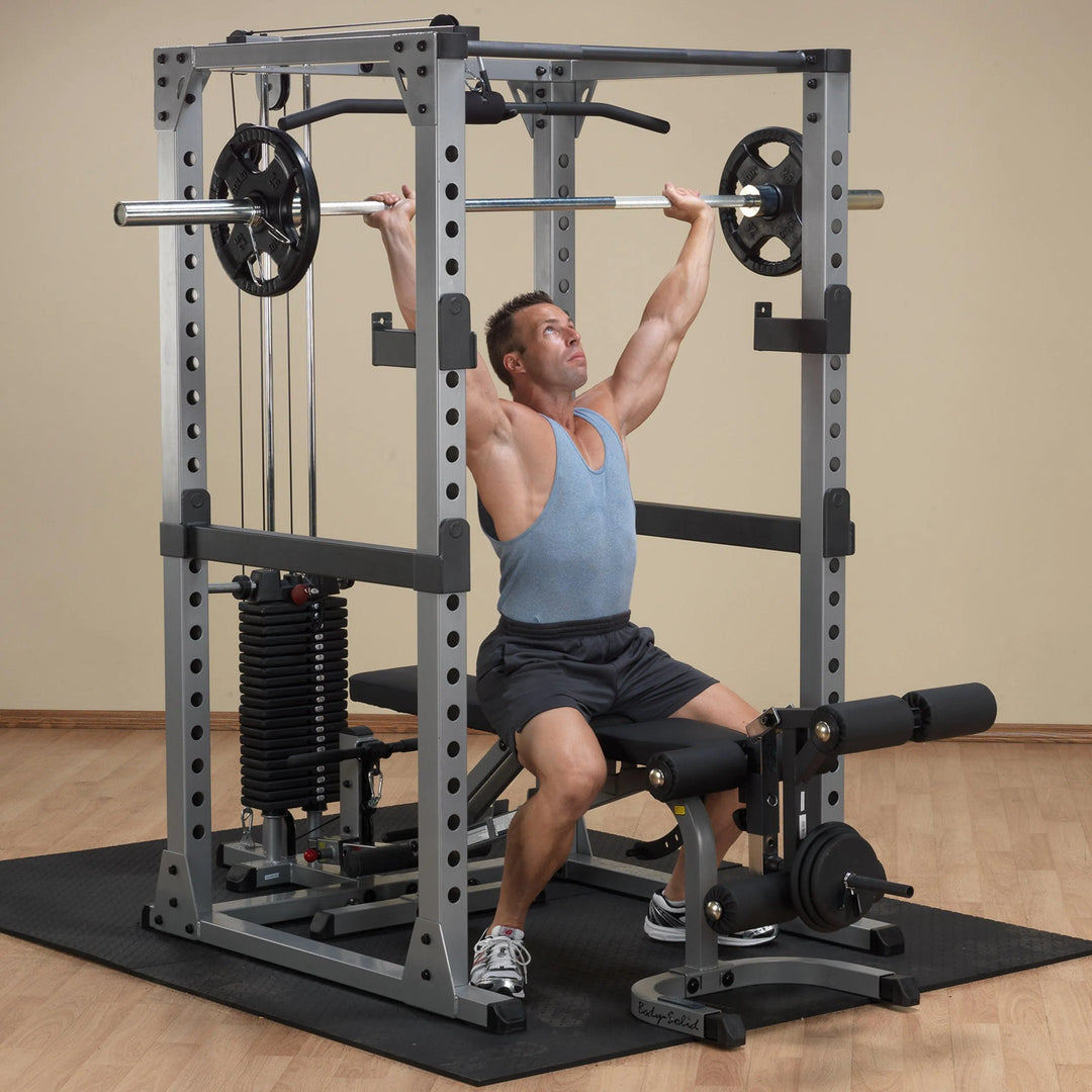 man seated barbell shoulder press on Body-Solid Power Rack Set GPR378P4