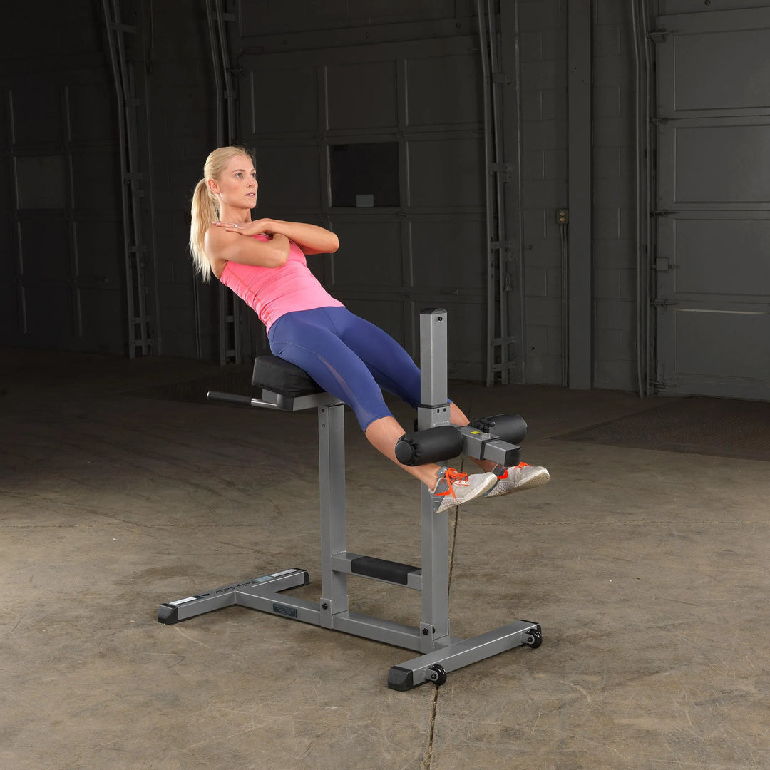 woman ab workout on Body-Solid Roman Chair Bench GRCH322