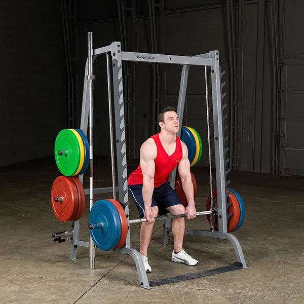 A man doing rack pulls on the Body-Solid Series 7 Smith Press & Squat Machine GS348Q