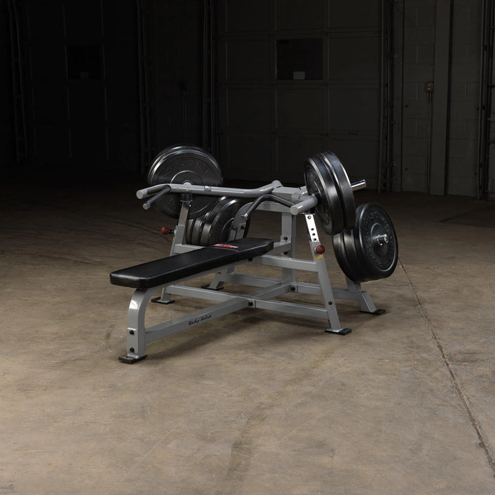 Body-Solid Bench Press Machine LVBP on display with weight plates