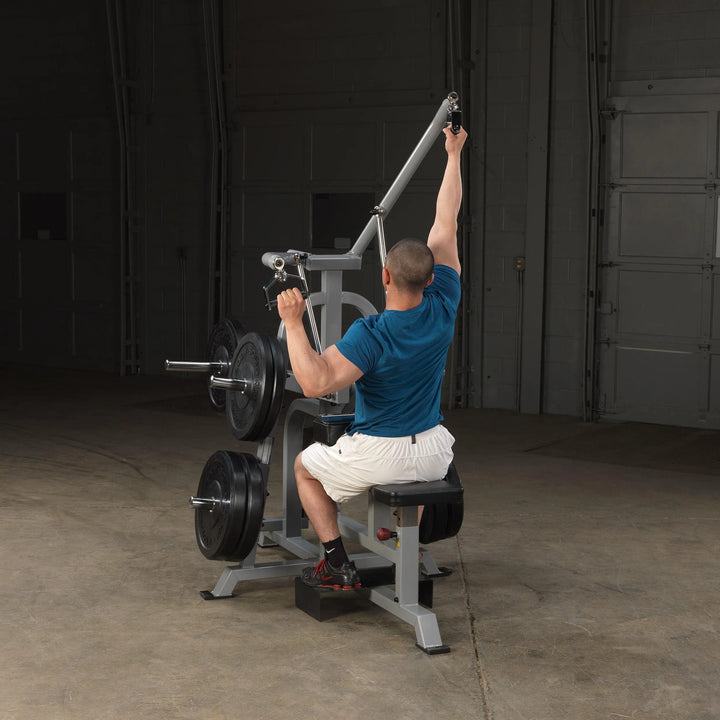 man alternating lat pull down exercise on Body-Solid Lat Pulldown Machine LVLA