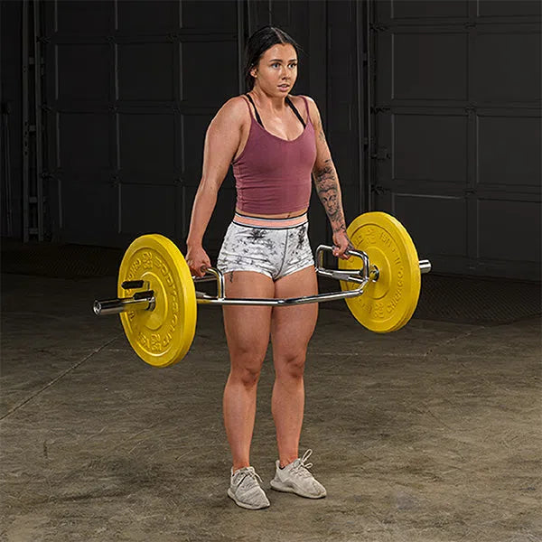 A woman training with the Body-Solid High Handle Trap Bar OTB50RH