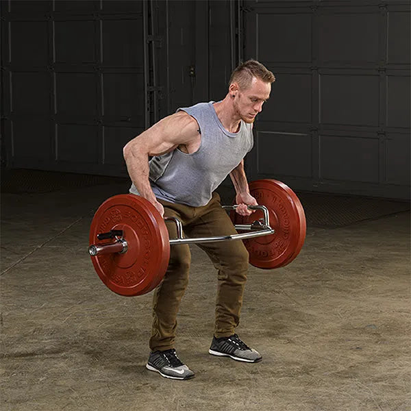 A man training with the Body-Solid High Handle Trap Bar OTB50RH