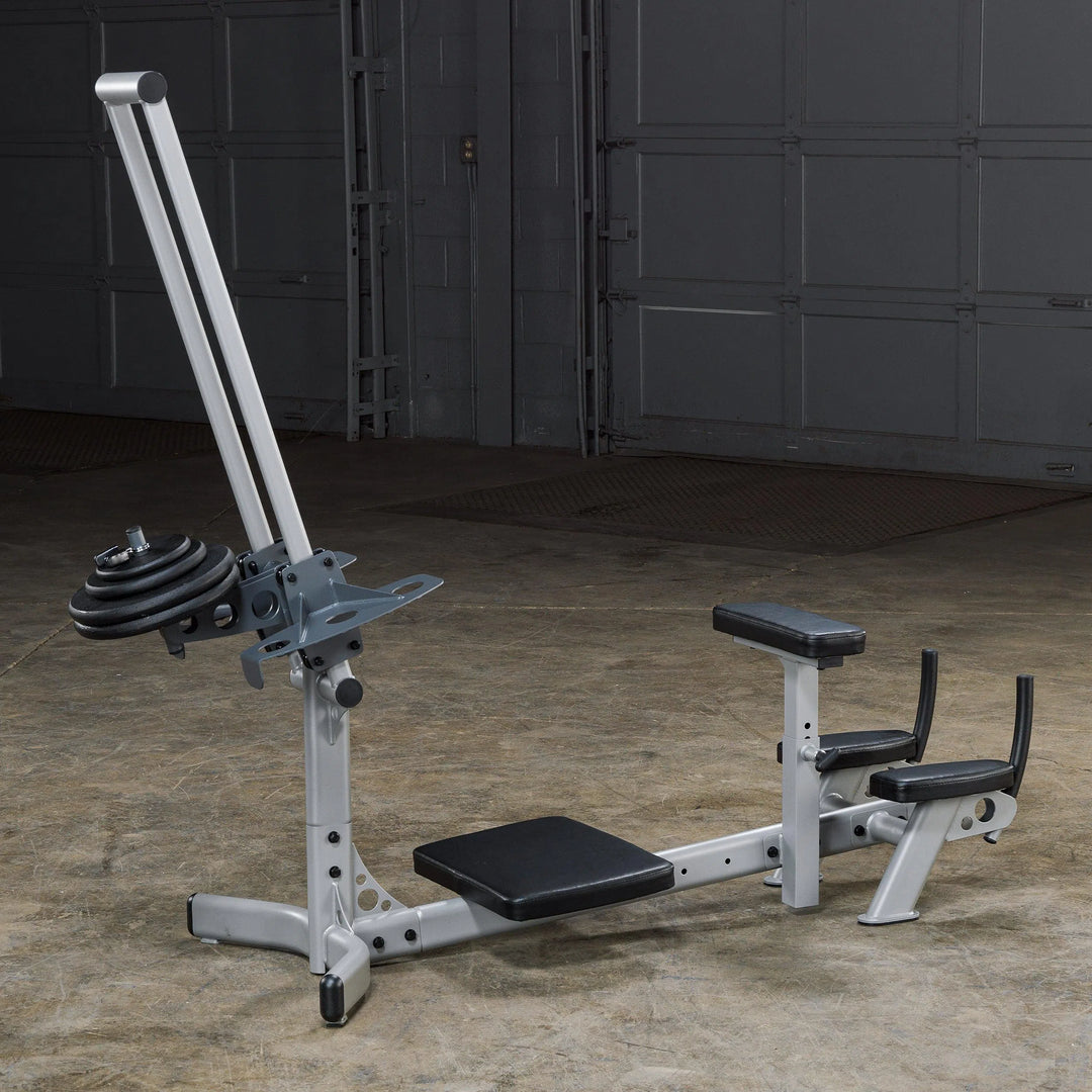 Body-Solid Powerline Glute Kickback Machine PGM200X on display with weight plates