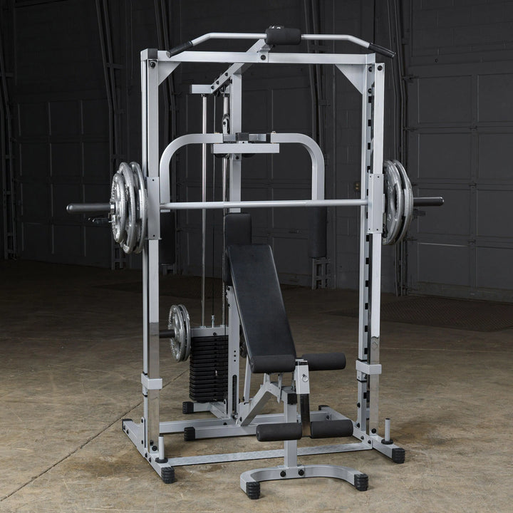 Body-Solid Powerline Home Smith Machine PSM1442XS on display with weight plates