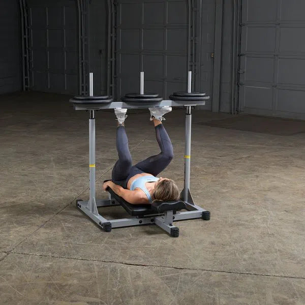 woman vertical leg press workout on Body-Solid Powerline Vertical Leg Press Machine PVLP156X