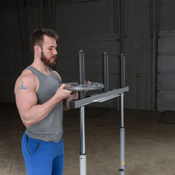 A man preparing to train on the Body-Solid Powerline Vertical Leg Press Machine PVLP156X