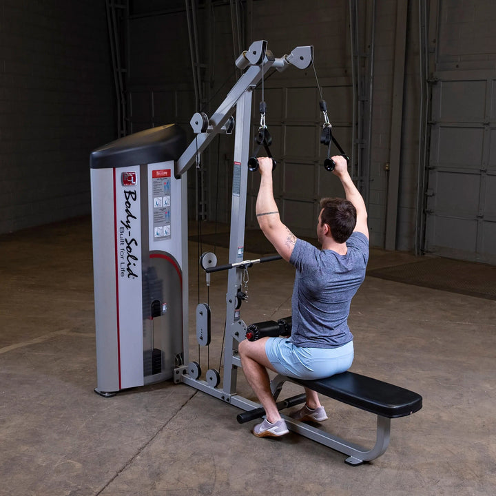 A man training on the Body-Solid Lat Pulldown and Row Machine S2LAT