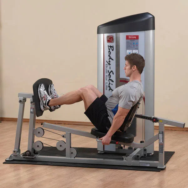  A man training on the Body-Solid Leg Press Machine S2LPC