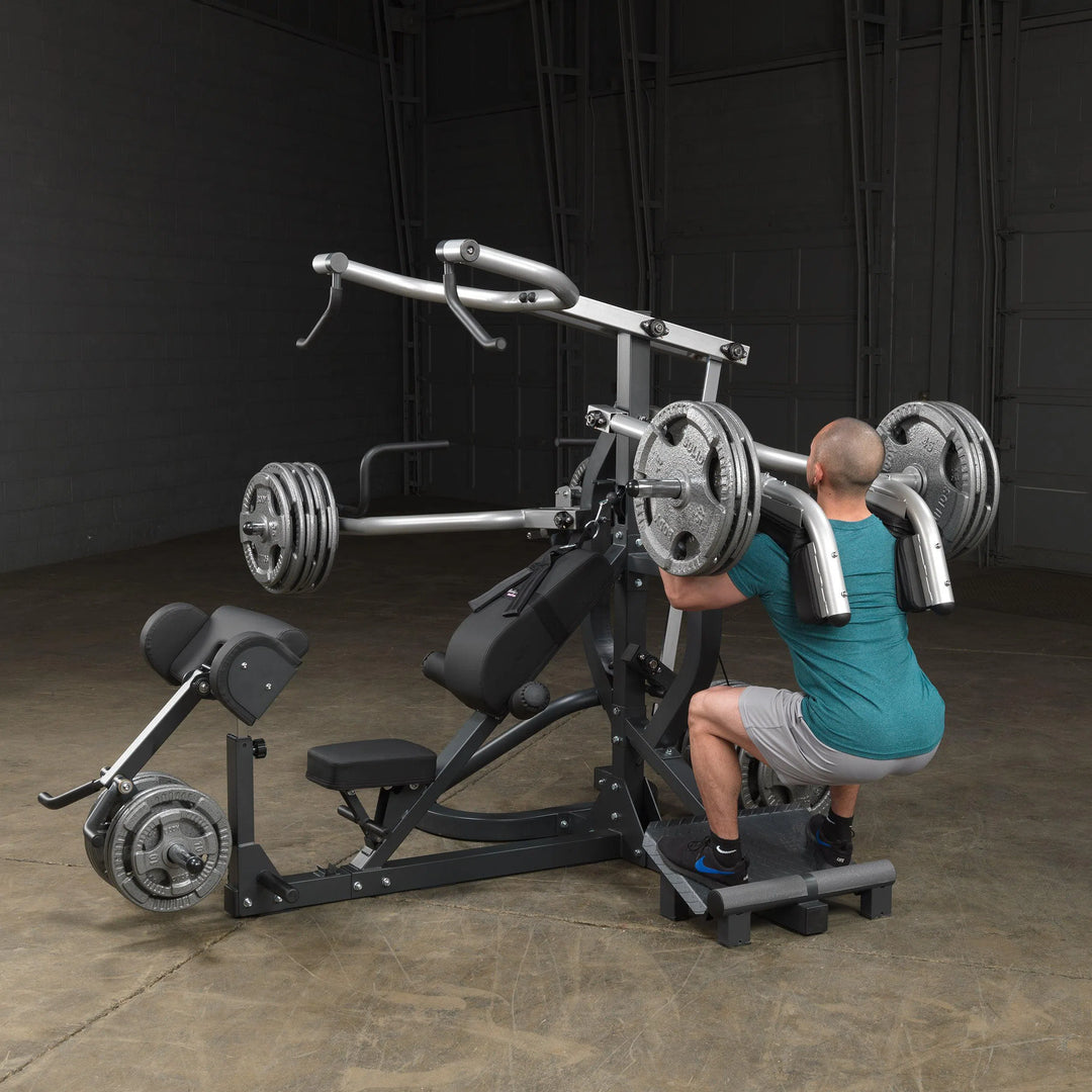 man squatting on Body-Solid Freeweight Leverage Gym SBL460P4