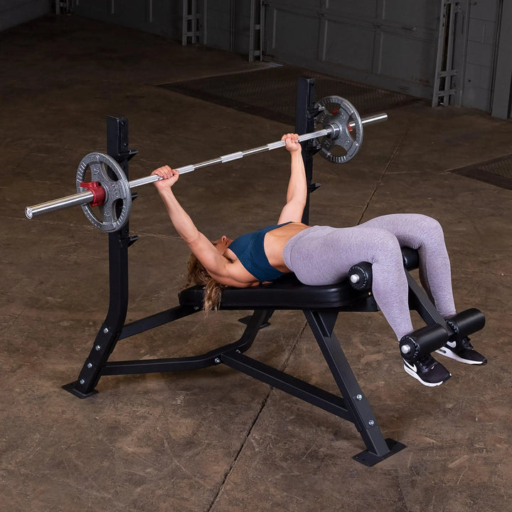 girl decline barbell bench press exercise on Body-Solid Commercial Olympic Decline Bench SODB250