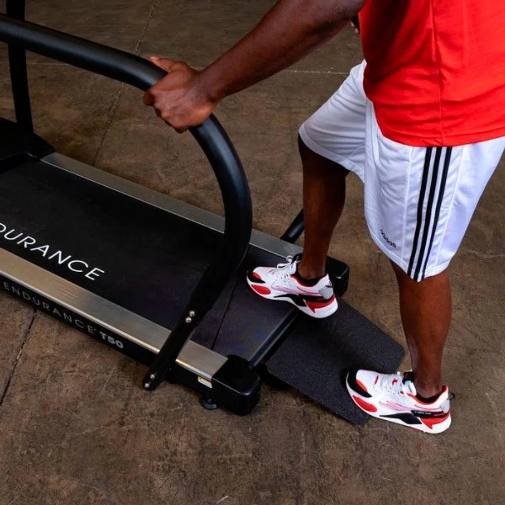 stepping up on the Body-Solid Endurance Walking Treadmill T50