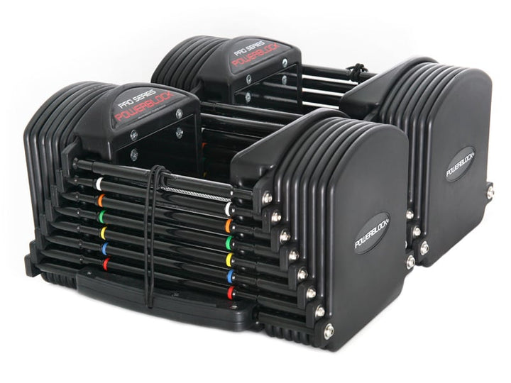 PowerBlock Commercial Pro 50 adjustable dumbbell with knurled stainless steel handle and urethane coated steel adder plates