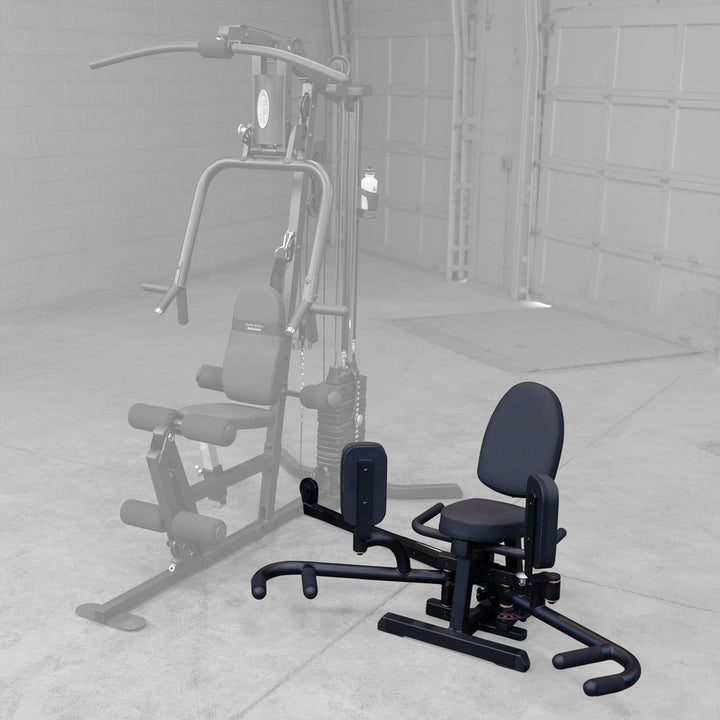 Body-Solid GIOT thigh attachment shown in the abduction position on a G Series gym