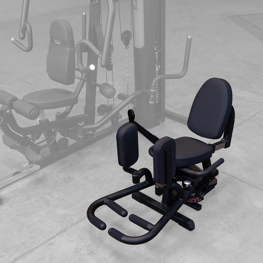 Body-Solid GIOT attachment on a G Series gym, showing the seat and lumbar supported back pad