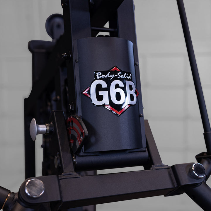 Close up of the G6B badge on the DuraFirm seat back pad of the Body-Solid G6B home gym