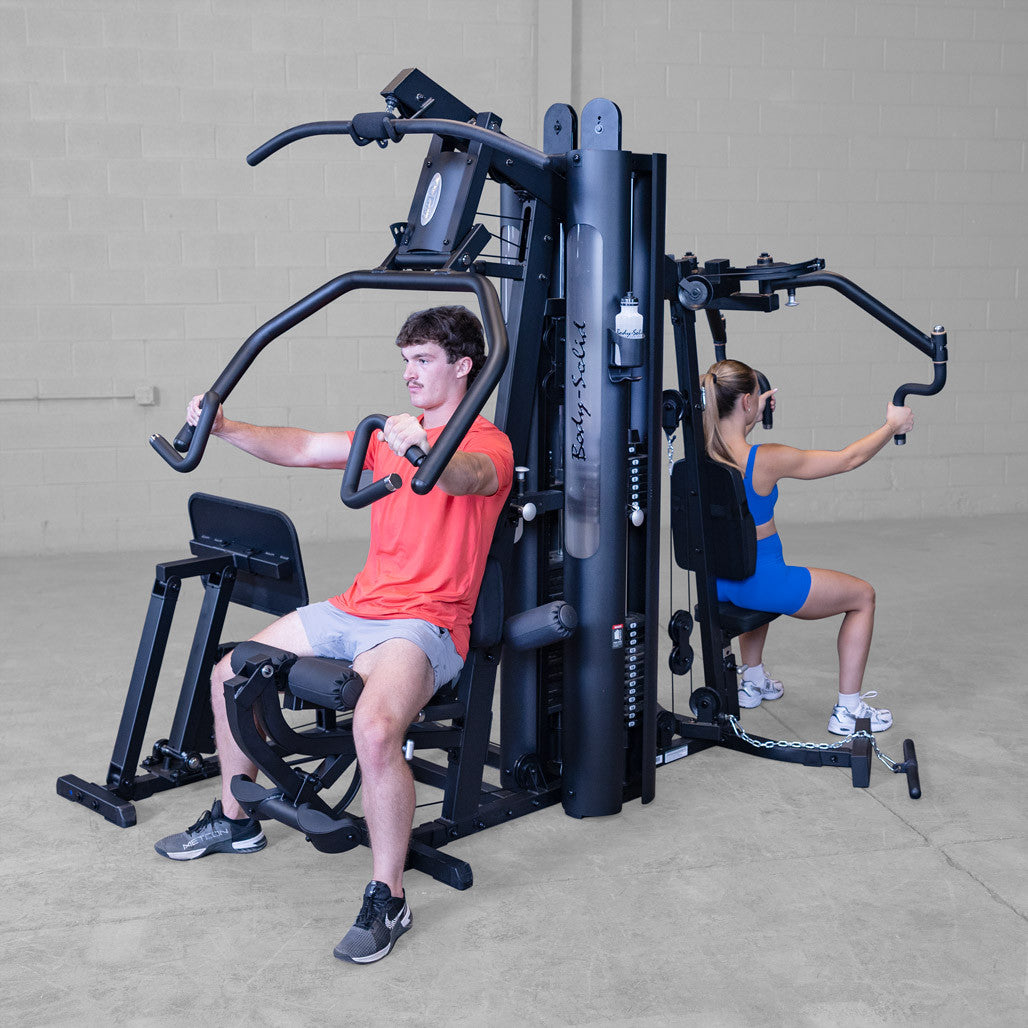 Body-Solid G9B multi-station gym, angled view of the press arm and Perfect Pec station