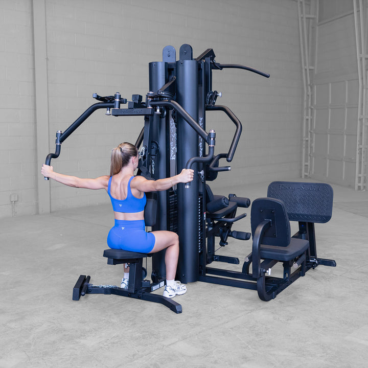 Body-Solid G9B multi-station gym, detail of the lat pulldown station and hold down pads