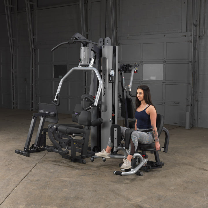 Body-Solid GIOT9 inner and outer thigh attachment mounted on a G9 multi-station gym