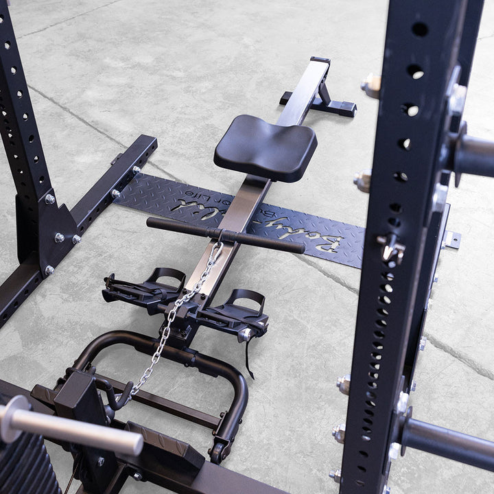 Body-Solid GROW rower attachment in use, showing the rowing stroke position