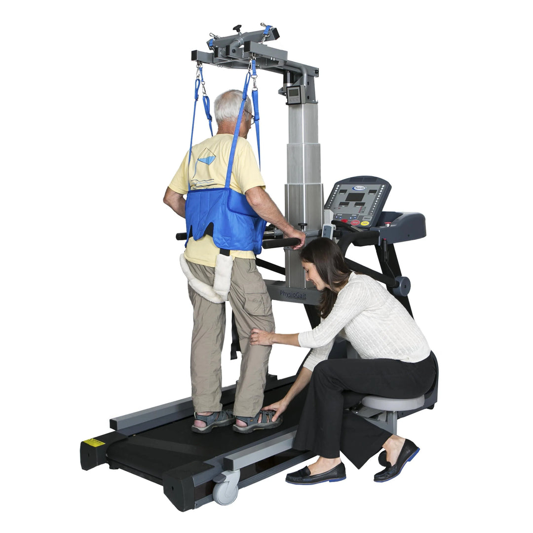 elderly man walking on HCI PhysioGait Anti-Gravity Gait Trainer for Treadmills assisted by a therapist