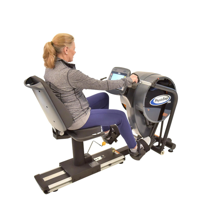 A senior woman training on the HCI PhysioStep PRO Physical Therapy Recumbent Bike SXT-1100
