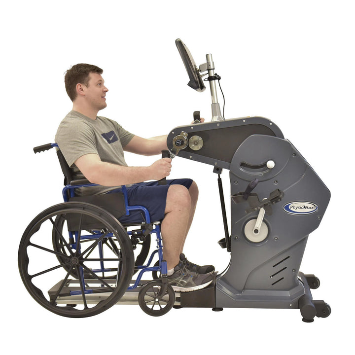 disabled man in wheelchair rehab on HCI PhysioMax Arm Ergometer and Recumbent Bike TBT-1000