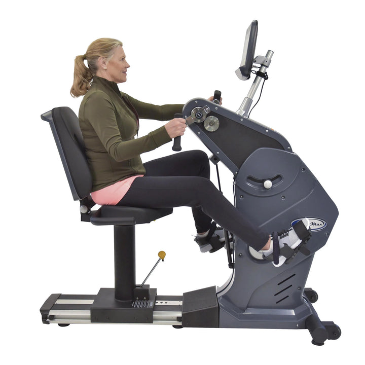 senior woman workout on HCI PhysioMax Arm Ergometer and Recumbent Bike TBT-1000