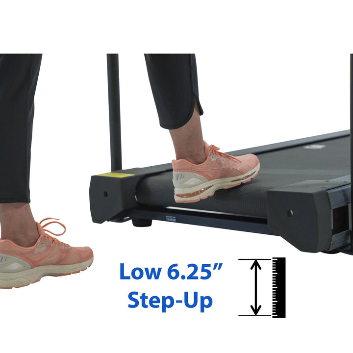 A woman undergoing therapy training on the HCI PhysioMill 500 lb. User Heavy Duty Treadmill TMR low step up clearance