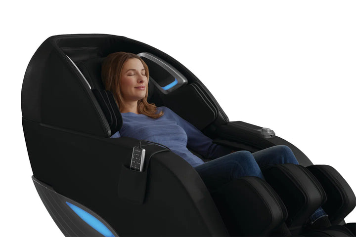 A woman relaxing on the Infinity Dynasty 4D Full Body Massage Chair Dynasty4D