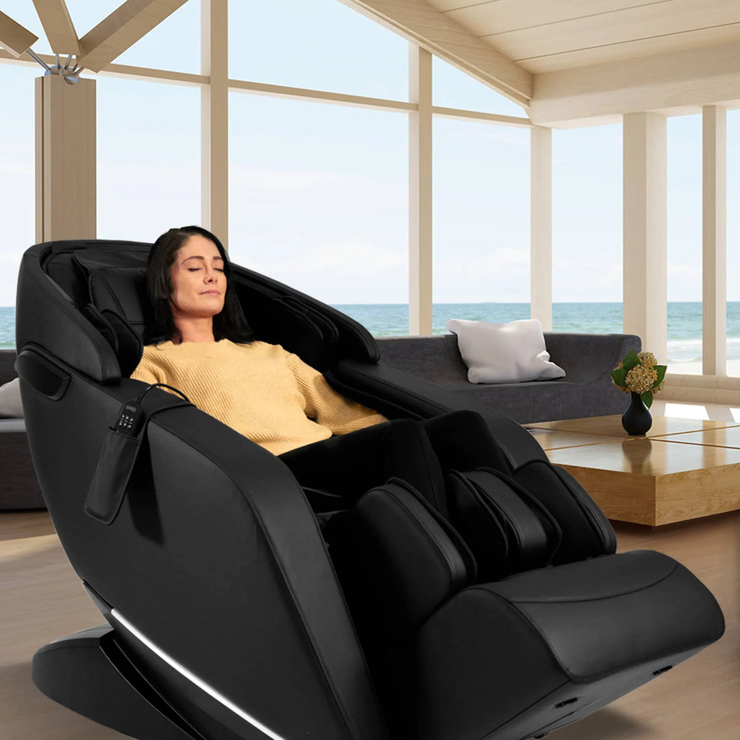 A woman relaxing in a Genki Full Body Massage Chair M380 black variant