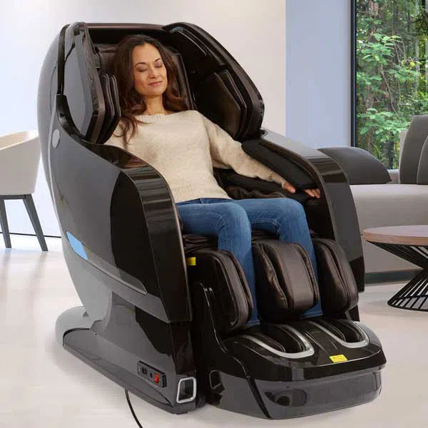 A woman relaxing in the Yosei L-Track 4D Full Body Massage Chair M868 4D brown variant