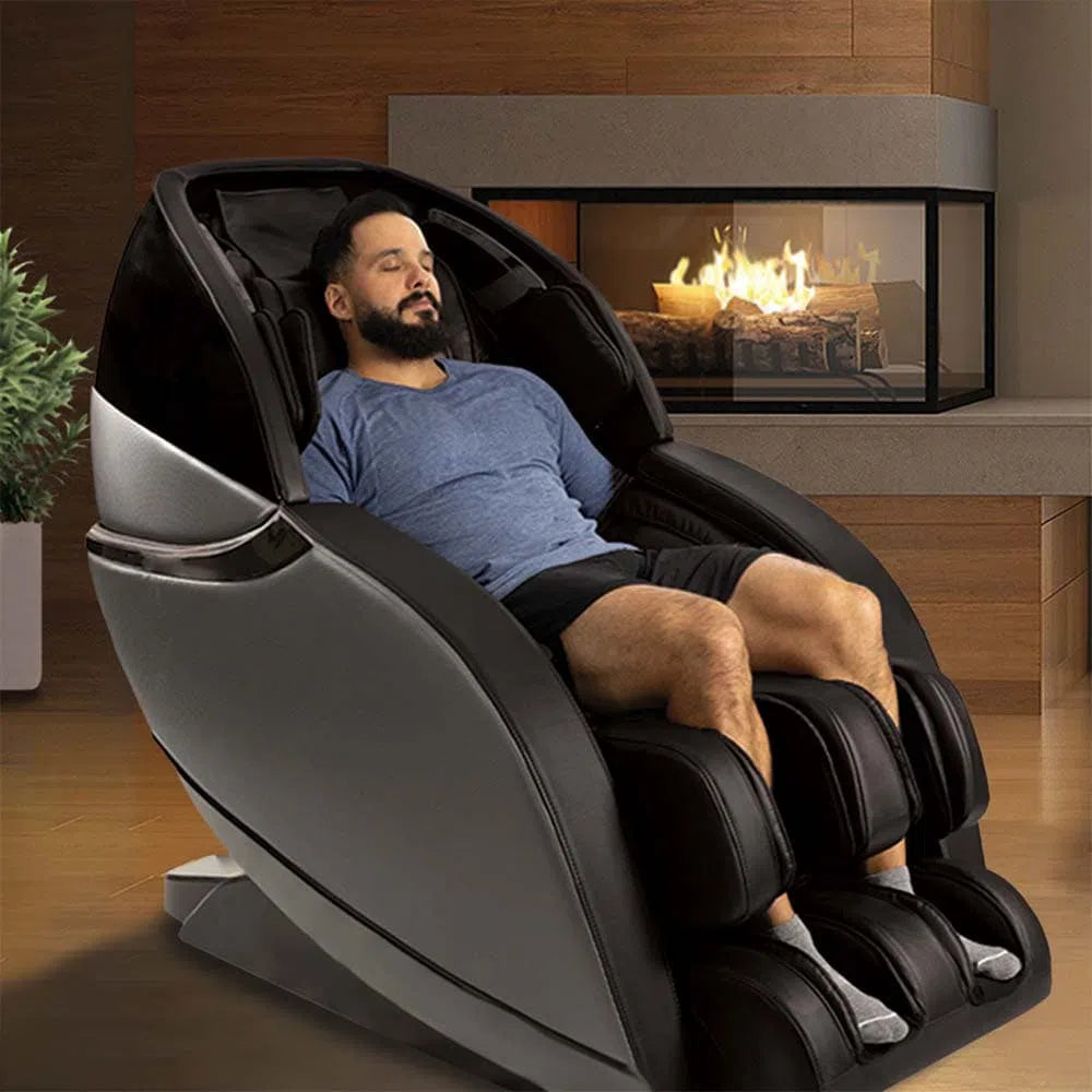 A man relaxing in the Kansha Full Body Massage Chair M878 black variant 