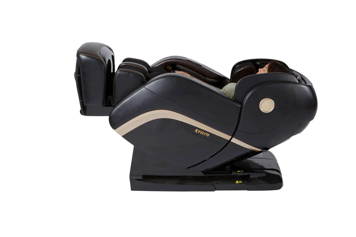 A woman relaxing in the Kokoro 4D Full Body Massage Chair M888 black variant in a reclined position