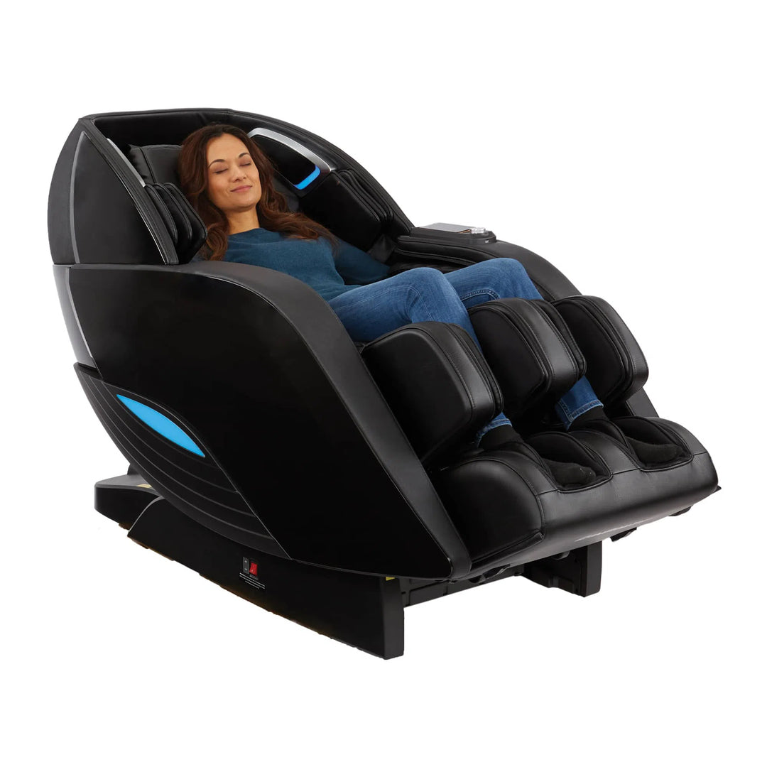 A woman relaxing in the Yutaka 4D Full Body Massage Chair M898 black variant