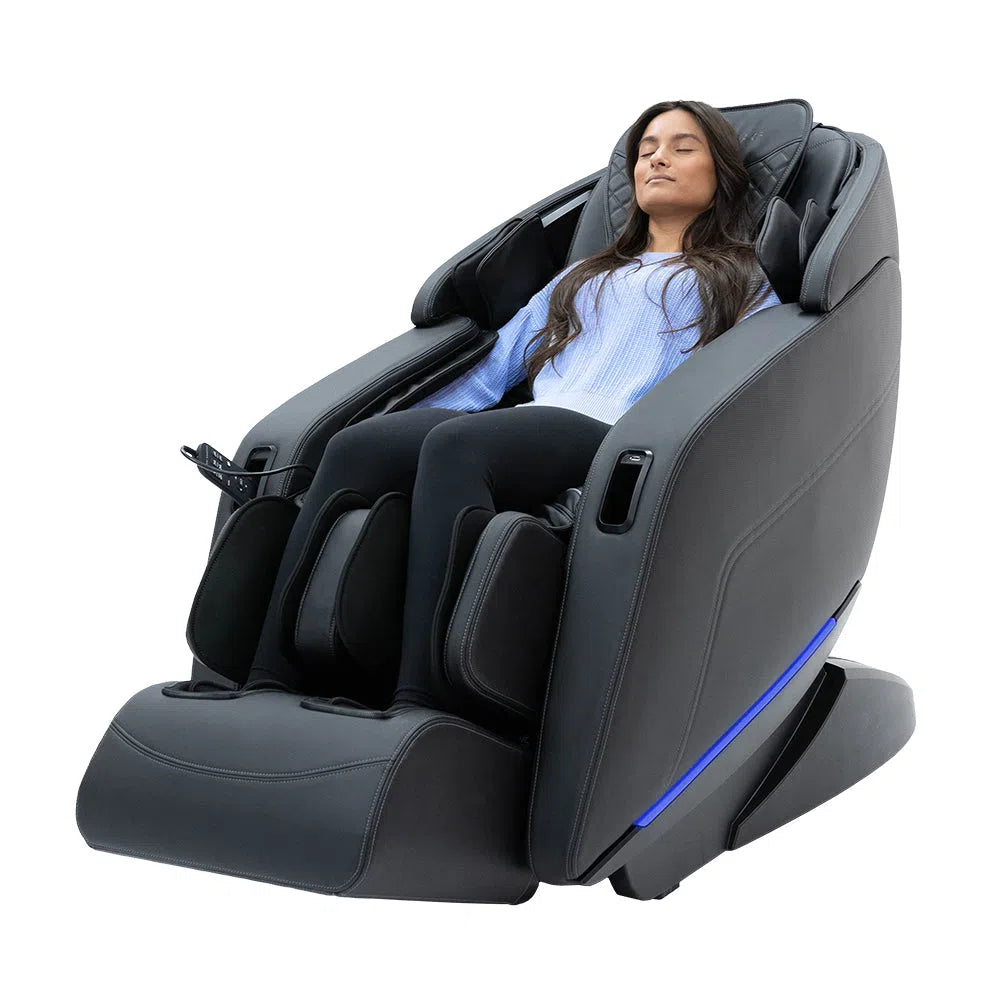 Lady-Sitting-Sharper-Image-Axis-4D-Full-Body-Massage-Chair-in-Black
