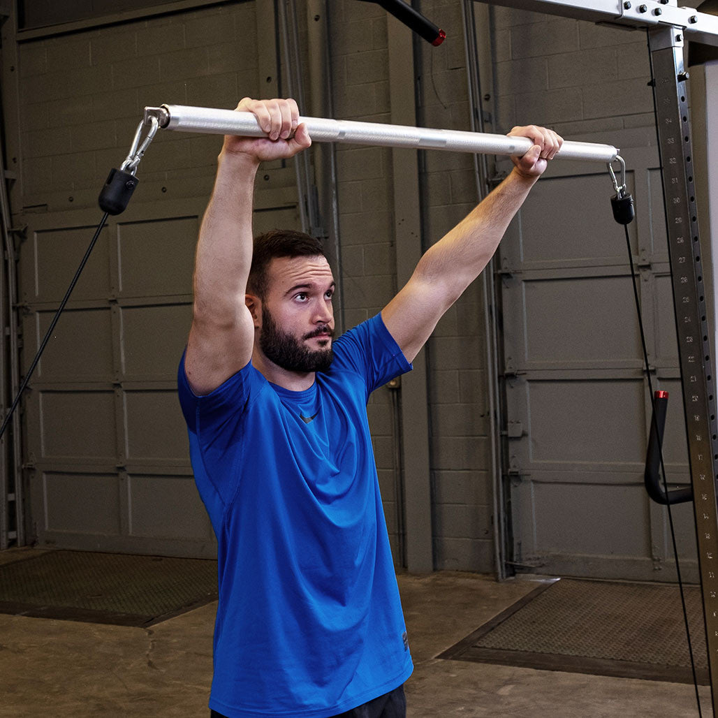 Body-Solid MB100A double swivel bar attached to a dual stack functional trainer