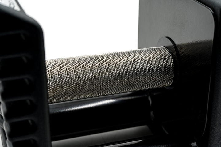 Close up of the diamond knurling pattern on the 38 mm stainless steel grip of the PowerBlock Pro 100 EXP