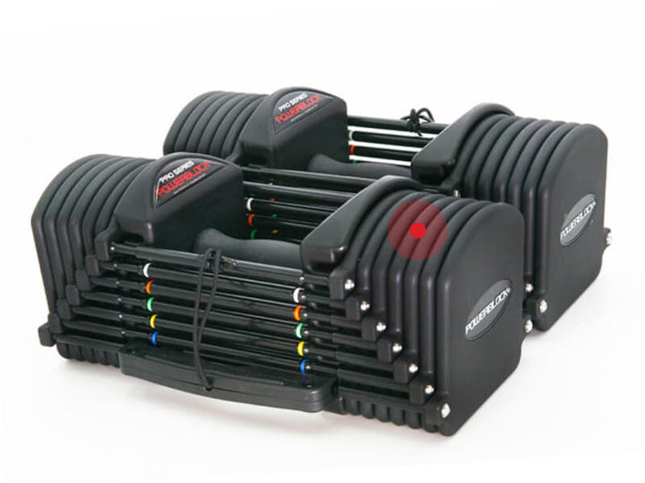 Urethane coated steel weight plates stacked inside the PowerBlock Commercial Pro 32