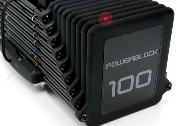 Single urethane coated steel weight plate from the PowerBlock Pro 100 EXP adjustable dumbbell