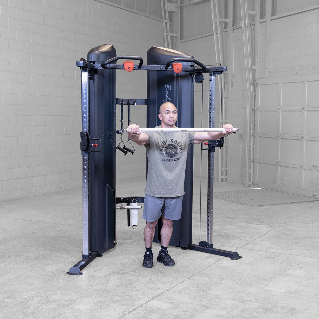 Body-Solid S2FTX functional trainer in use, standing cable press